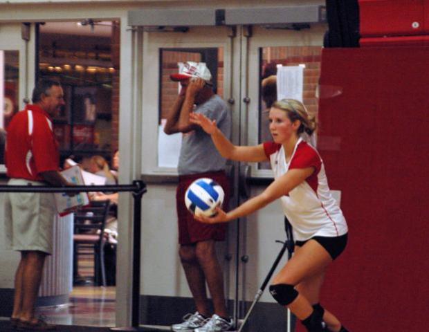 Lisa Urbanksi prepares to serve against Schoolcraft College. The Express swept the match 3-0. Photo by Nicholas Huenefeld/Owens Sports Information