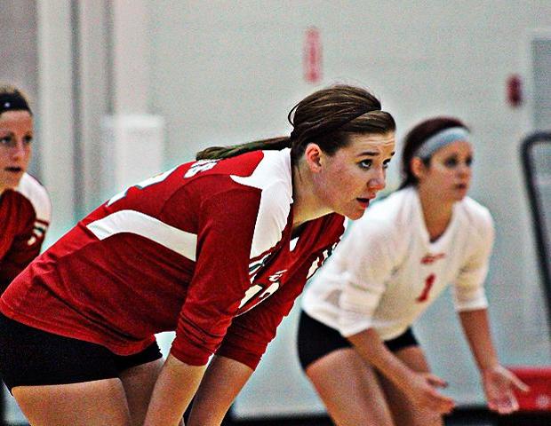 Kayla Siefker (front), Macy Reigelsperger (back left) and Ciarra Wirick (far right) helped lead the Owens volleyball team to a 3-1 record in this weekend's Grand Rapids Invitational. Photo by Nicholas Huenefeld/Owens Sports Information