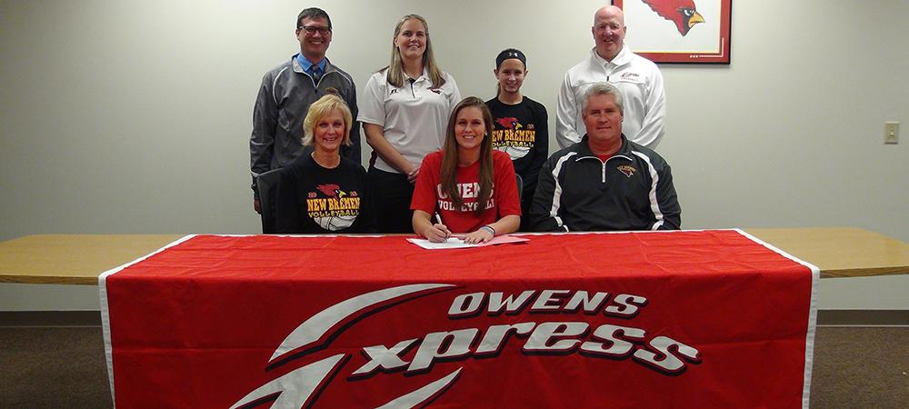 Devon Heitkamp is pictured here with her mother Jill, her sister Diane, her high school head coach Theresa Jenkins, her dad Greg, New Bremen AD Gary Jones and Owens volleyball assistant coach Denny Caldwell. Photo by Nicholas Huenefeld/Owens Sports Information