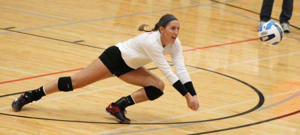 Ally Mikesell dives for a ball. She is now one dig away from 600 in her career. Photo by Nicholas Huenefeld/Owens Sports Information