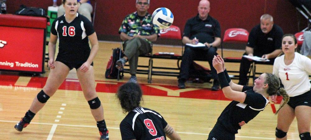 Brooke Gyori fends off an attack from Lorain County in tonight's match. Photo by Nicholas Huenefeld/Owens Sports Information