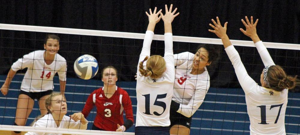 Tyanna Smith picks up a kill during today's win over No. 20 GRCC. Photo by Nicholas Huenefeld/Owens Sports Information
