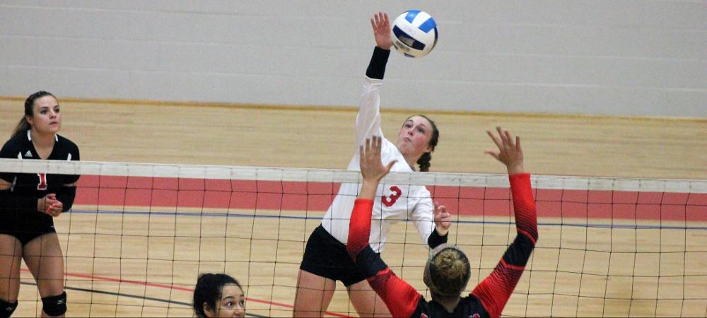 Brooke Gyori makes a back row attack in today's win over No. 4 Catawba Valley. Photo by Nicholas Huenefeld/Owens Sports Information