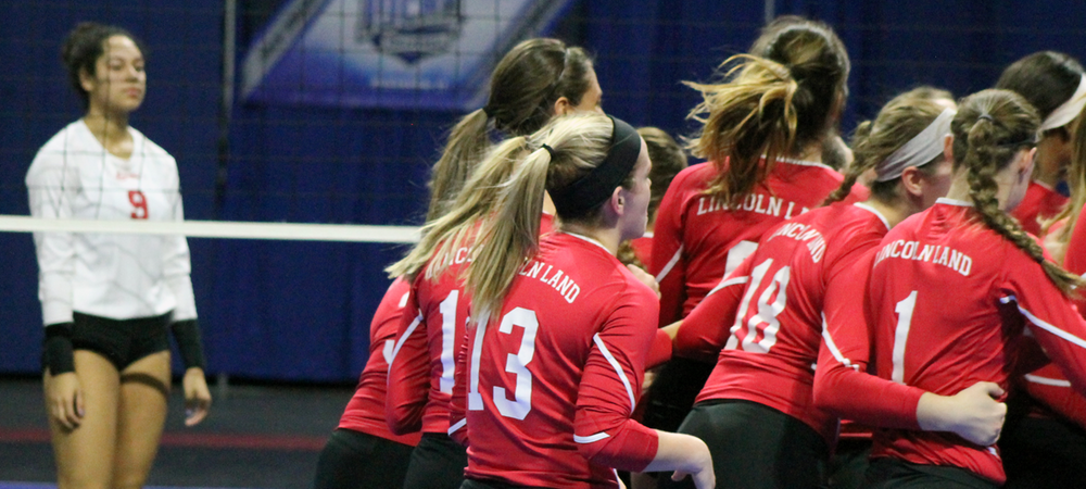 Tyanna Smith looks on as Lincoln Land celebrates match point. Photo by Nicholas Huenefeld/Owens Sports Information