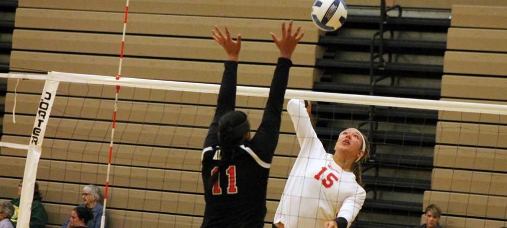 Ashley Pleiman picks up one of her 11 kills against Rend Lake. Photo by Nicholas Huenefeld/Owens Sports Information